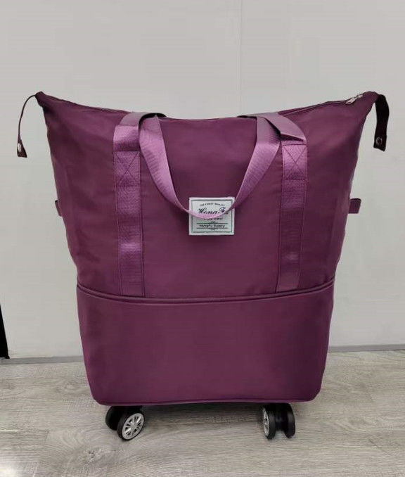 Sac pliable avec roues épaule imperméable à l'eau sac à usage extérieur sac de voyage sac à dos pliant sac de voyage