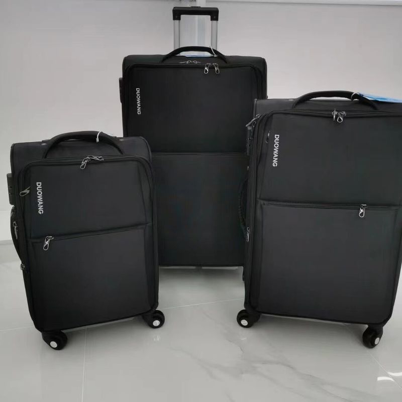 Vente en gros d'une valise polyester ancienne