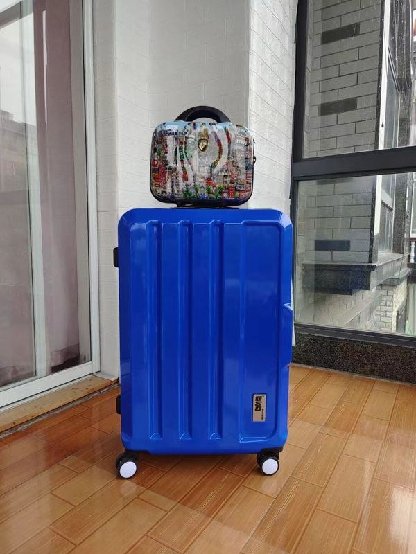 De haute qualité Chine usine de nouveau design coloré coquille dure imperméable à l' eau ensemble cadeau Abs en gros valise Fermeture à glissière Temps de trajet