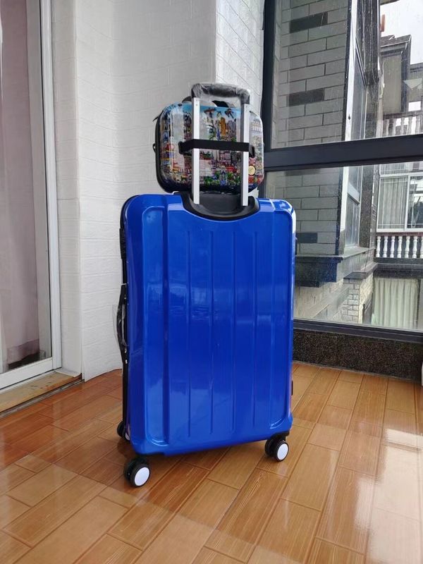 De haute qualité Chine usine de nouveau design coloré coquille dure imperméable à l' eau ensemble cadeau Abs en gros valise Fermeture à glissière Temps de trajet