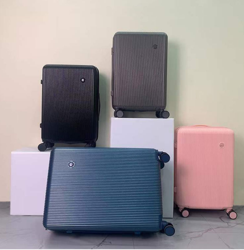 Un ensemble de bagages avec port USB avec porte-gobelets, sac de voyage, une valise ABS de haute qualité.